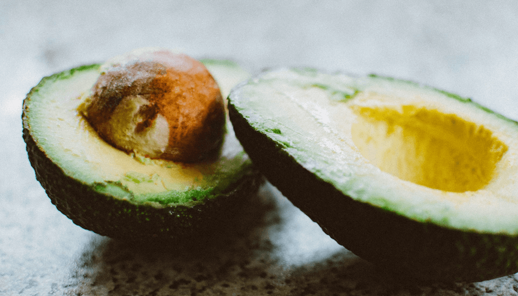 Two avocado halves